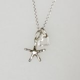 ‘Love in the Sea’ – Silver Mini Sea Star Necklace with Open Heart Charm
