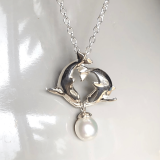 Reintroducing Wyland’s Sterling Silver Playful Dolphins with Pearl